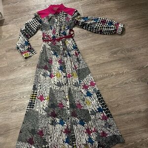 This beautiful dress I bought when I went to France. Worn twice.